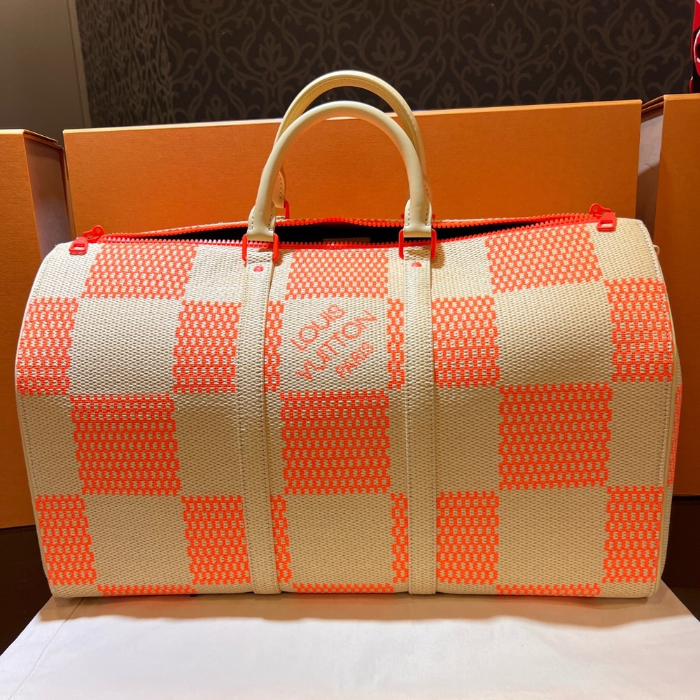 LOUIS VUITTON
KEEPALL BANDOULIERE 50